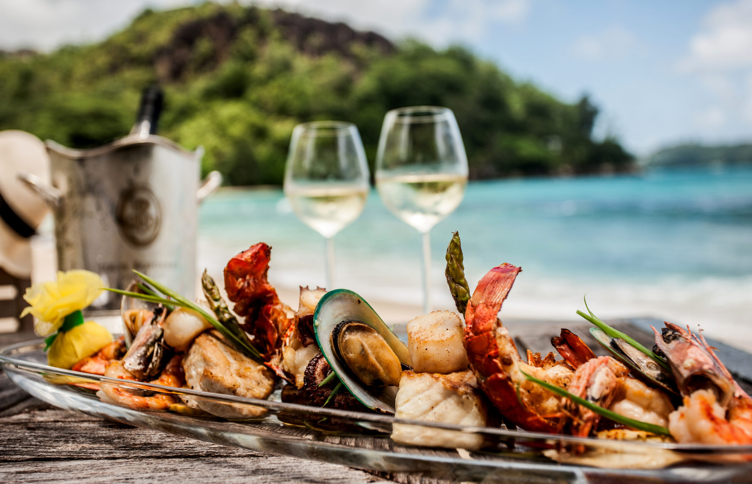 Beach picnic spread with fresh fruit and snacks